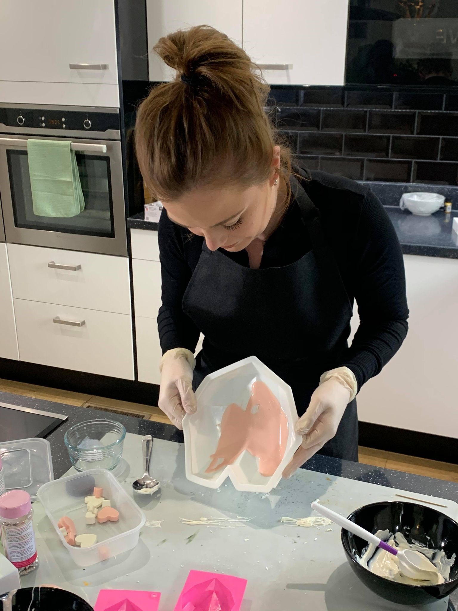 Aimee creating her latest box in her kitchen 