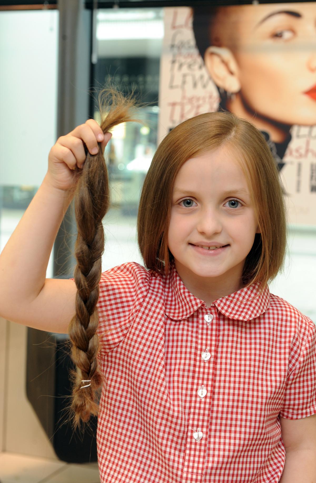 Schoolgirl Has Her Long Locks Cut For Children With Cancer